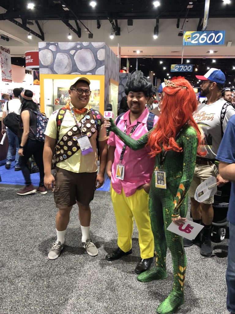 US Weekly reporter interviews Comic Con attendees in costumes